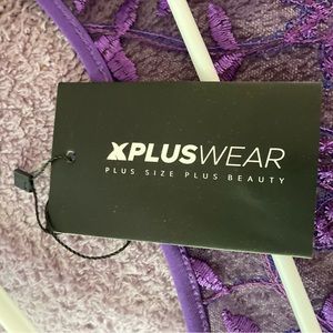 Sequined purple dress with feathery cuffs & hem.